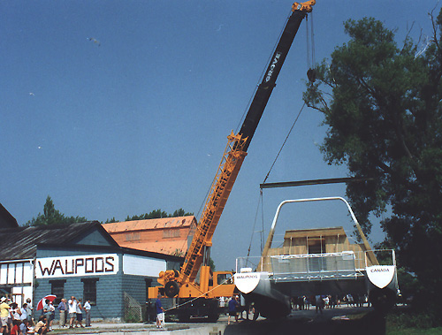 The crane swings Errant into launch position